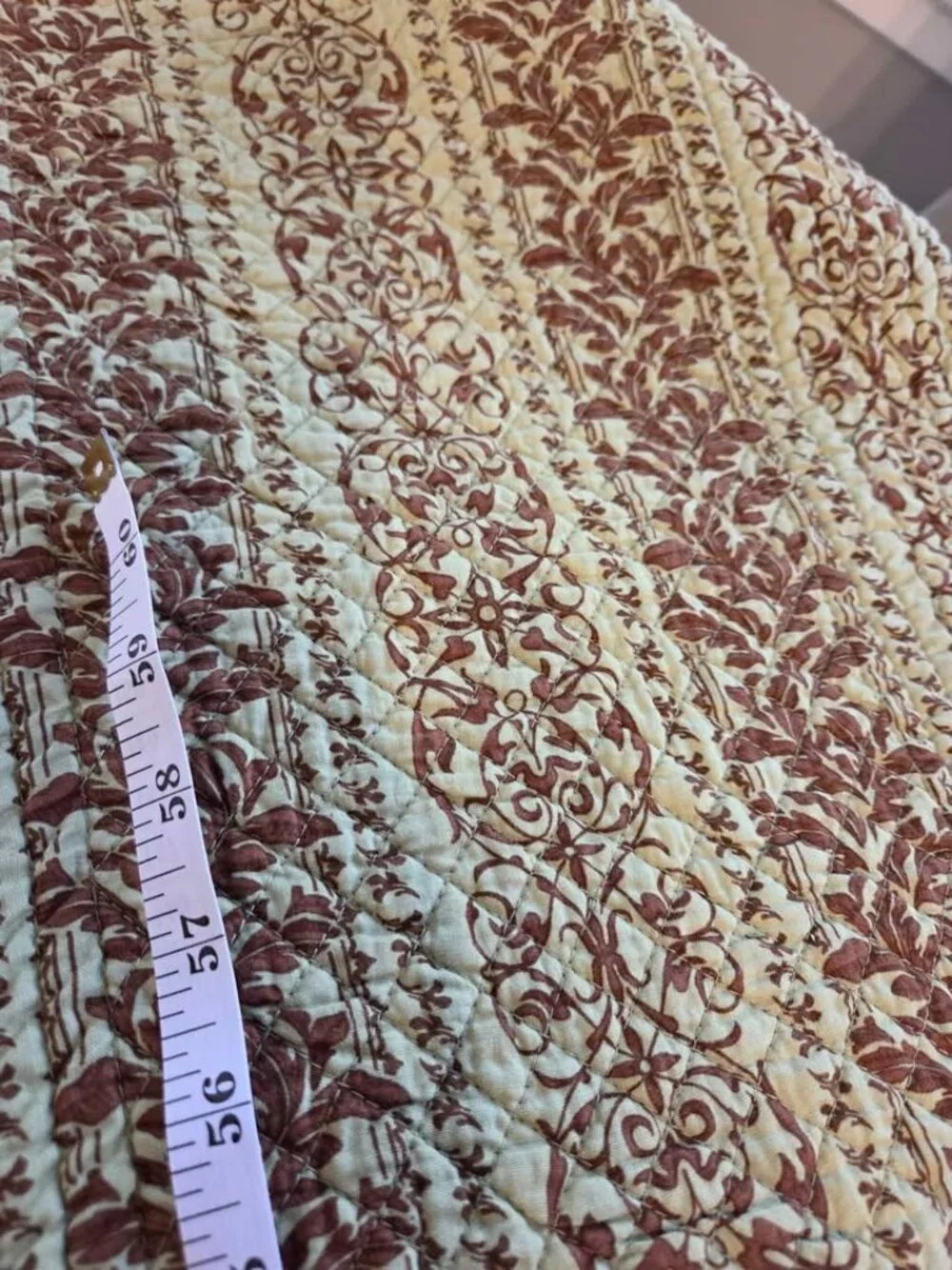 Brown and green quilted table runner